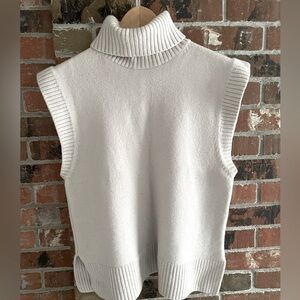 Aritzia “Babaton” wool off white/bone turtleneck vest, size small.